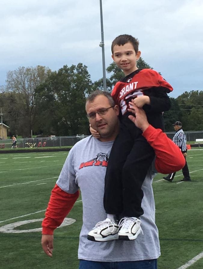 A compassionate high school football team makes 7-year-old with cerebral palsy team captain for the day. Credit: Brittany Jenkins