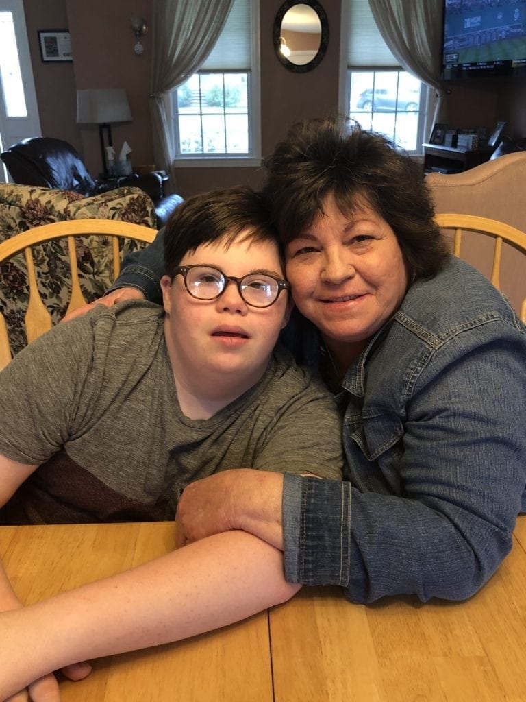 Teacher opens her home & heart to adopt a boy with Down syndrome after he lost his mother to cancer. 