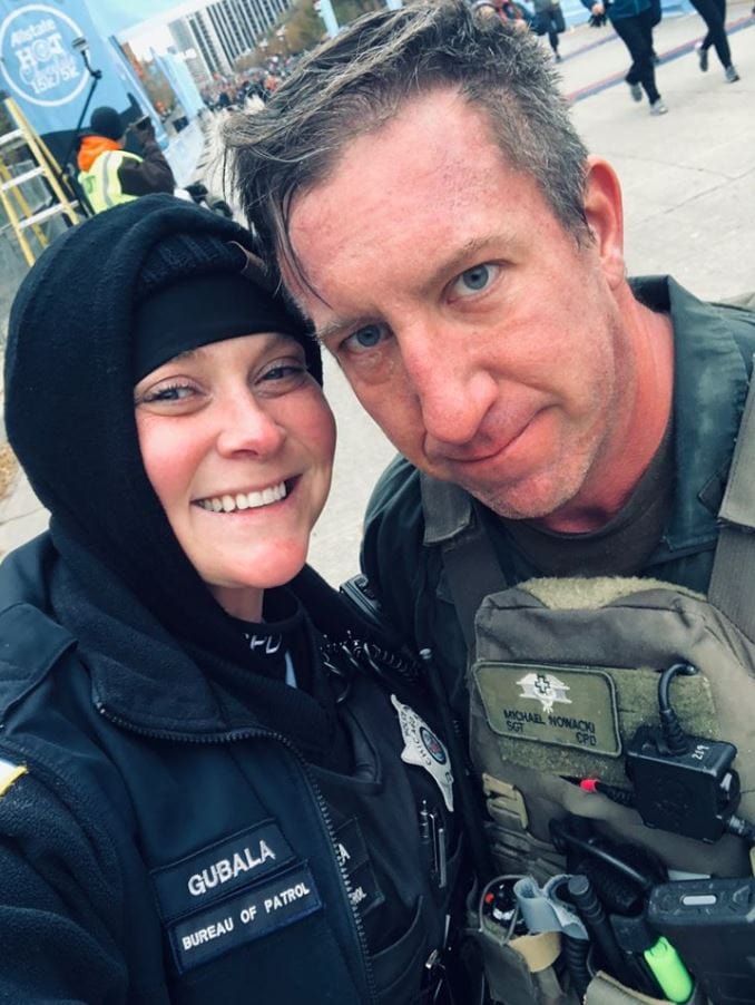 SWAT Sgt. saves a woman's life while running 15k for charity in full gear, then proposes to fiance - all in one day.