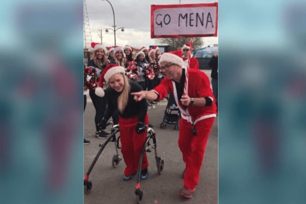 Girl with cerebral palsy overcomes the odds to finish annual Santa Run in record time using a walker