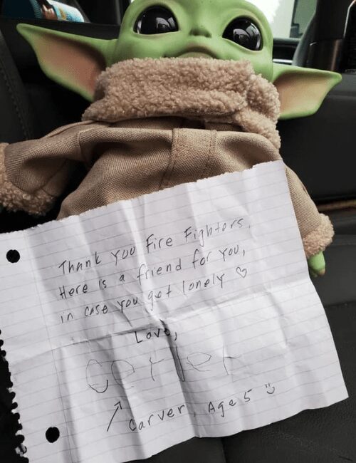 Baby Yoda with hand-written note from Carver.