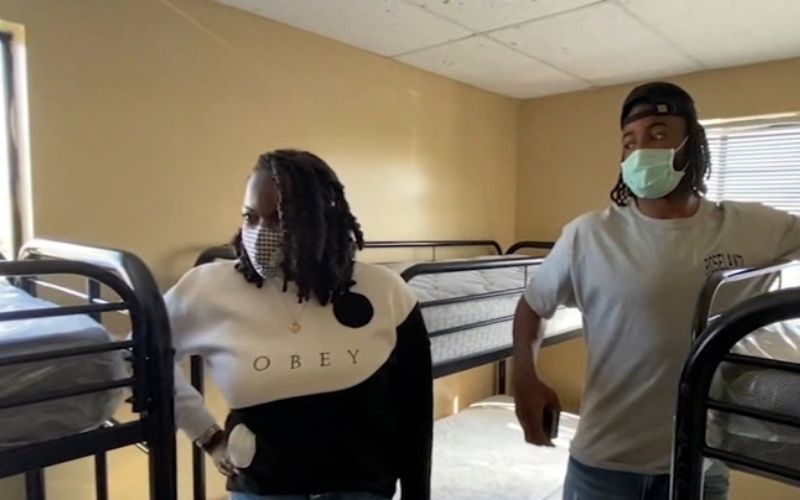 Najee Harris and his Mom at the homeless shelter where they lived over 10 years ago.