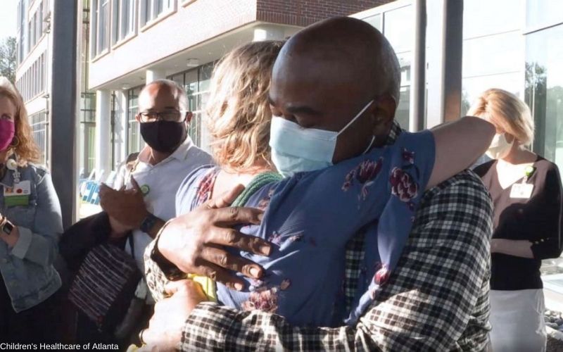 Susan Ellis hugs Rodney Wimbush at Children's Healthcare of Atlanta.