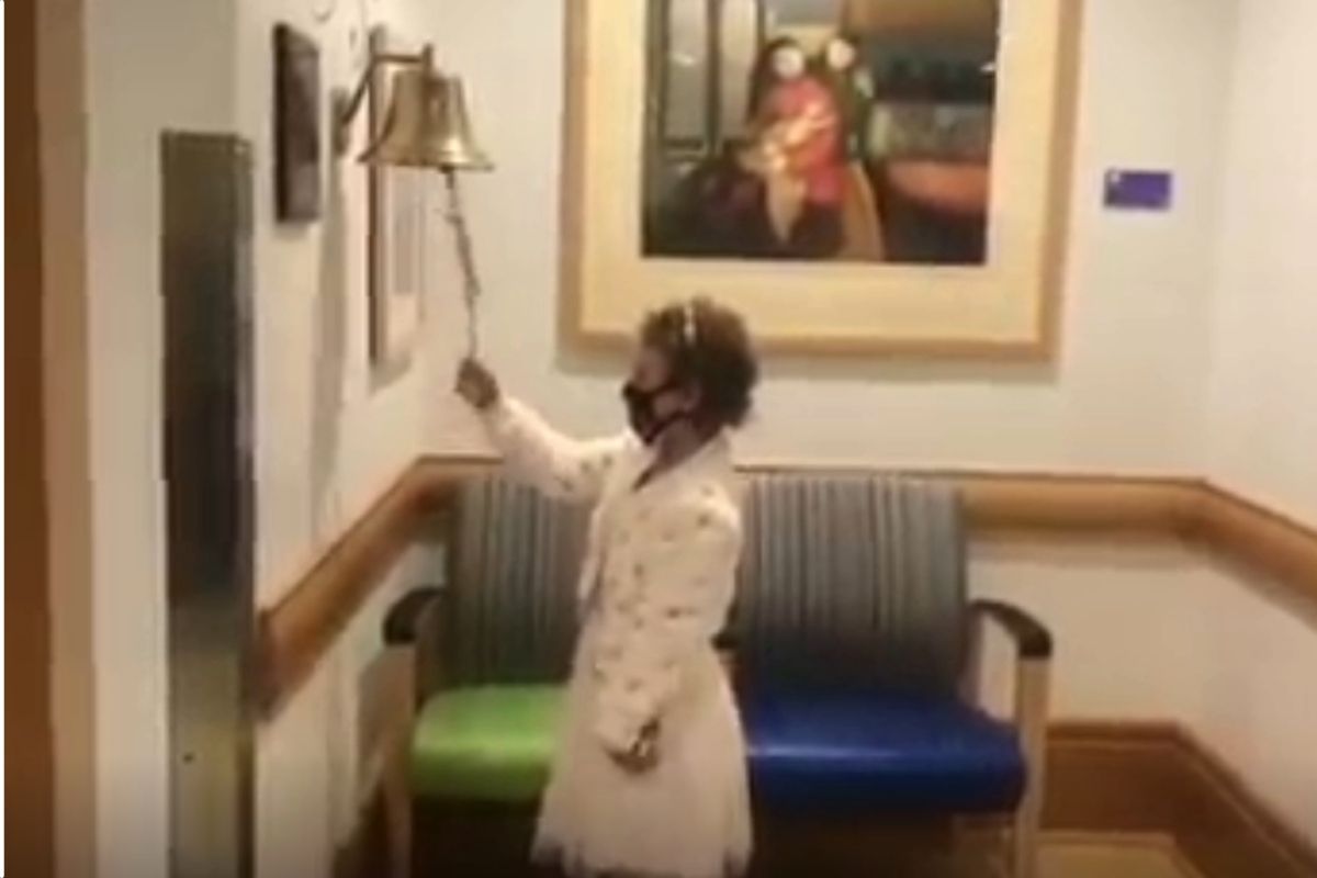 Little girl rings the victory bell after beating leukemia