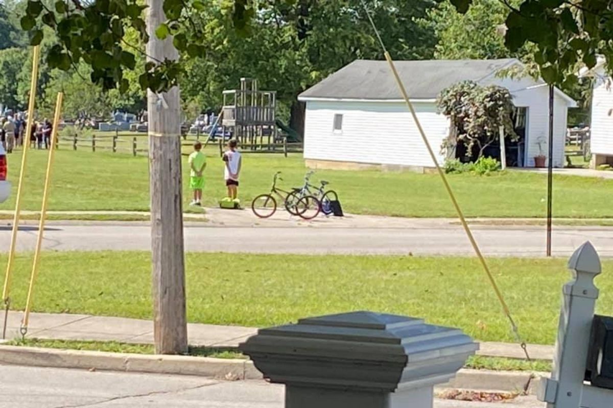 Indiana boys immediately jump off bikes to honor military veteran after seeing his funeral service