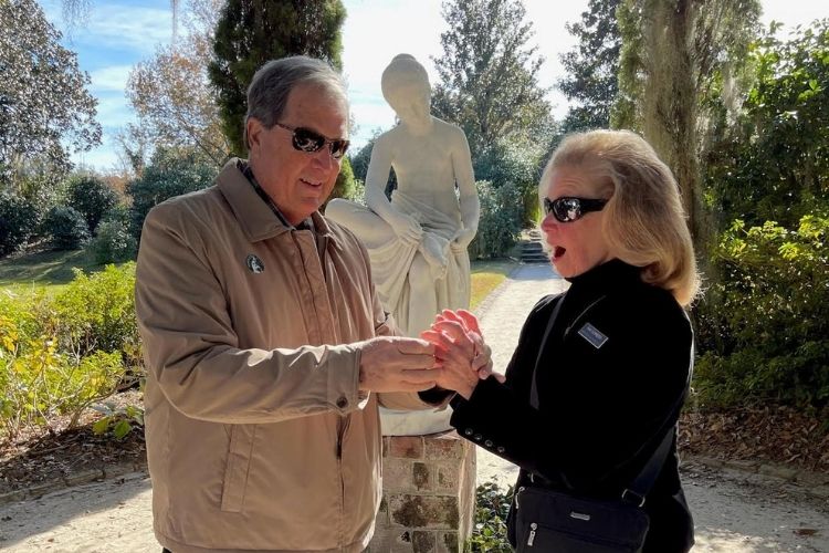 After asking a stranger to capture the moment, Ron proposed to Pat at Middleton Place Gardens.